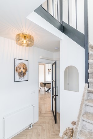 Foto - Verkocht onder voorbehoud: Instapklare gemoderniseerde geschakelde 2 onder 1 kap woning  met aanbouw, open keuken, tuin en garage in Voerendaal